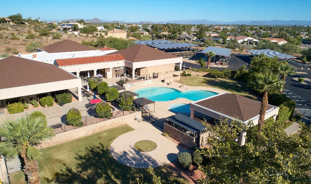 Aerial view of Broken Arrow Elks Lodge with pool and grounds